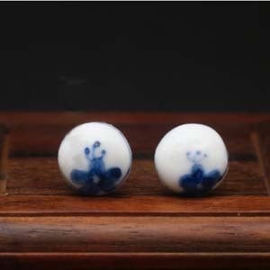 Zhao Dao<br />oorbellen met blauwe bloem</p>
