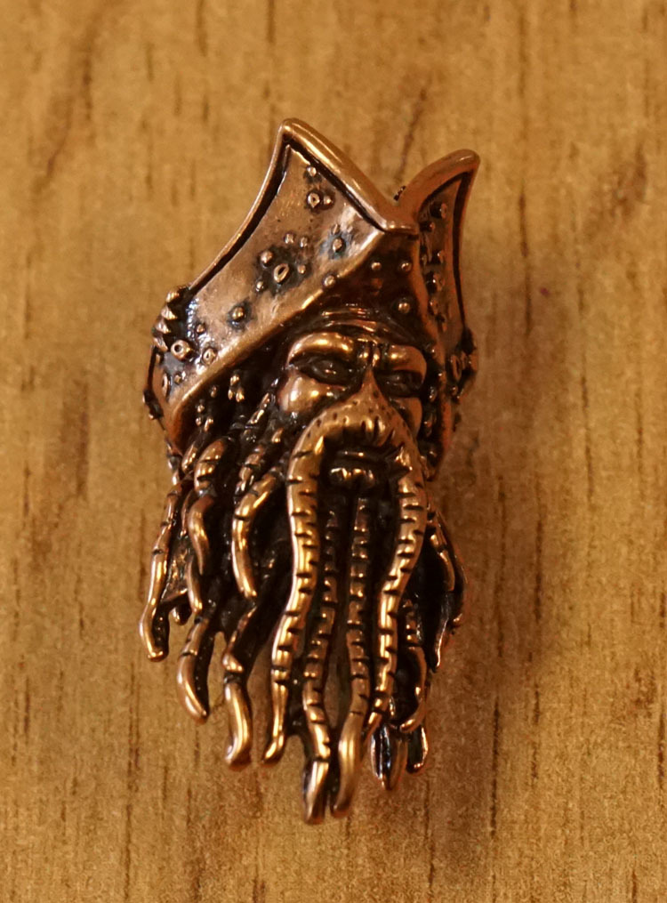 Baardkraal " Piraten octopus "  bronskleurig per stuk.