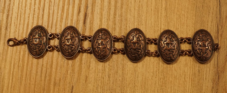 Middeleeuwse armband " Keltische honden " roodkoperkleurig