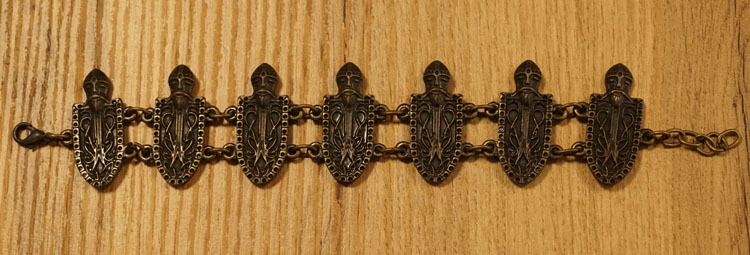 Middeleeuwse armband " Ridderhoofd + schild " bronskleurig
