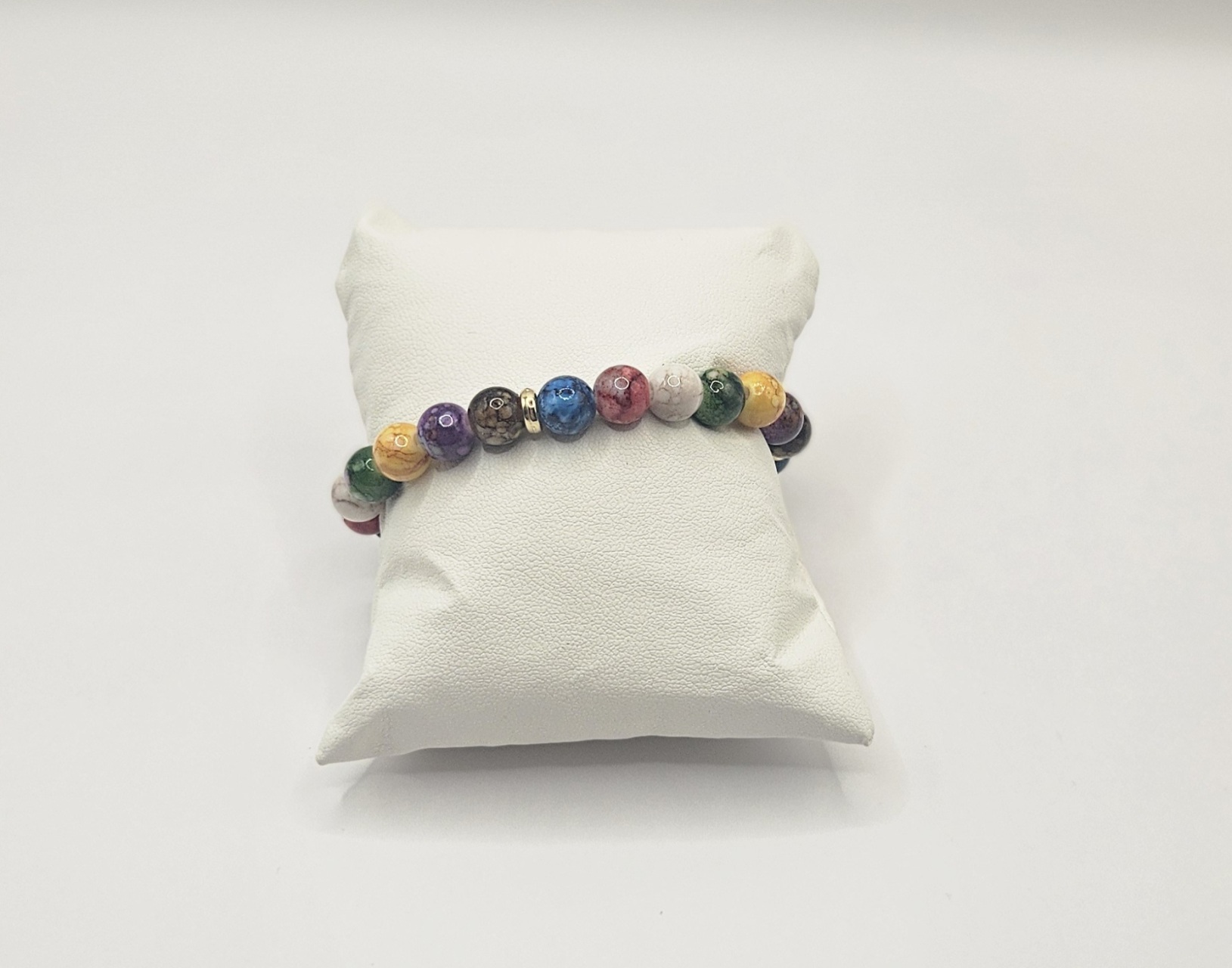 Chakra armband met zeven gekleurde stenen voor energiebalans